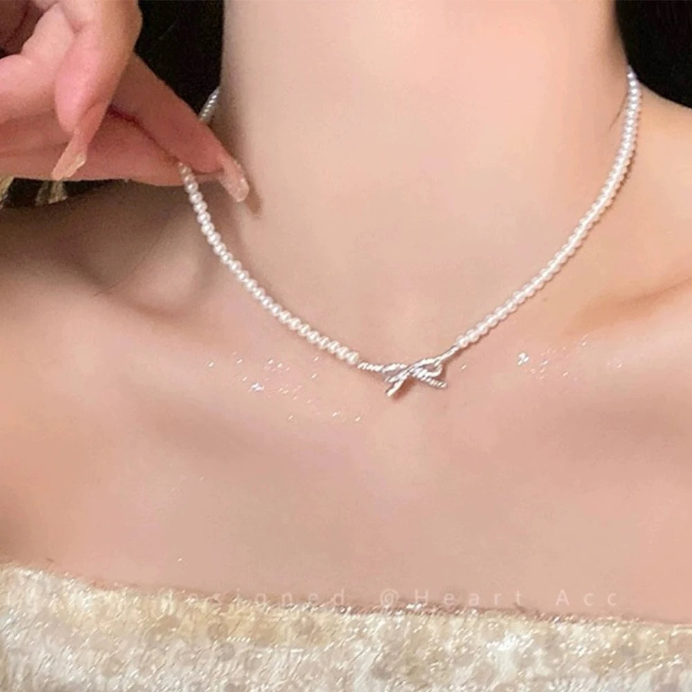 PQT-992 Bow Shape Pearl Pendant Necklace – Elegant Women’s Jewelry in Silver & Gold Finish