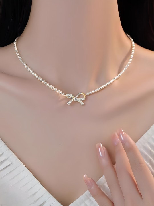 PQT-992 Bow Shape Pearl Pendant Necklace – Elegant Women’s Jewelry in Silver & Gold Finish